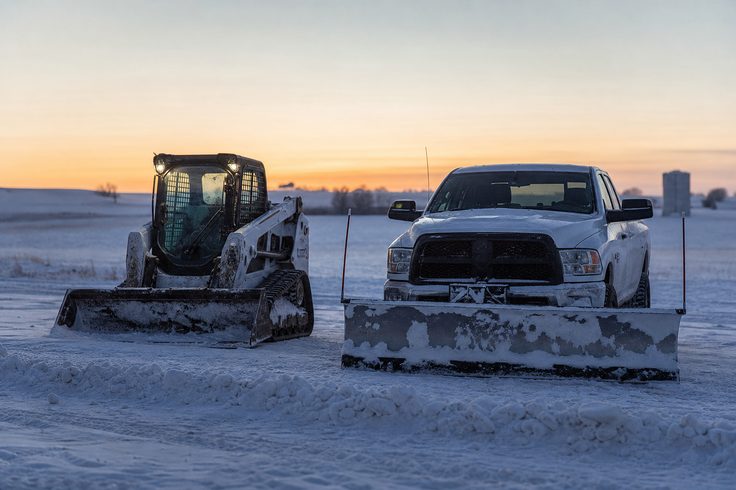 Snow removal equipment staged before a winter storm in Saskatoon
